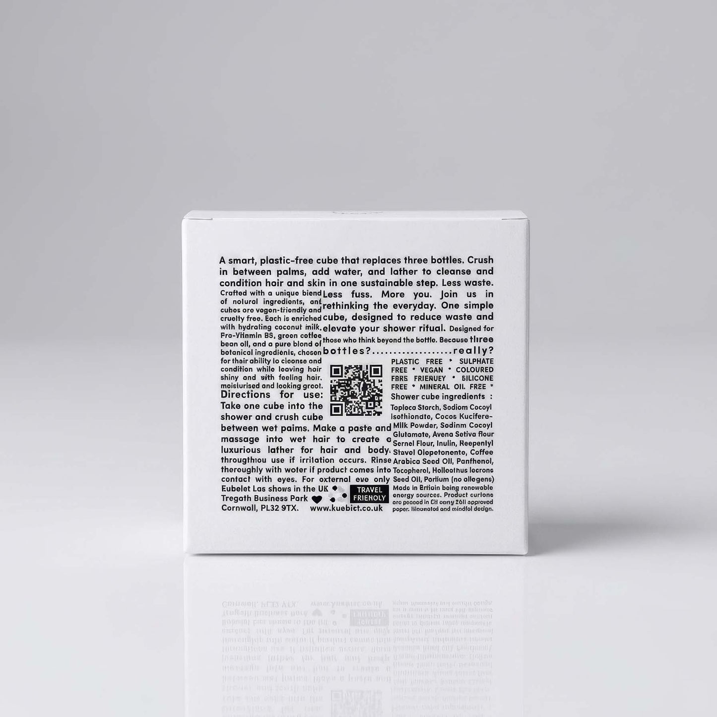 Kubeist 3 in Product packaging with text and QR code on a gray background plastic free shower cube 