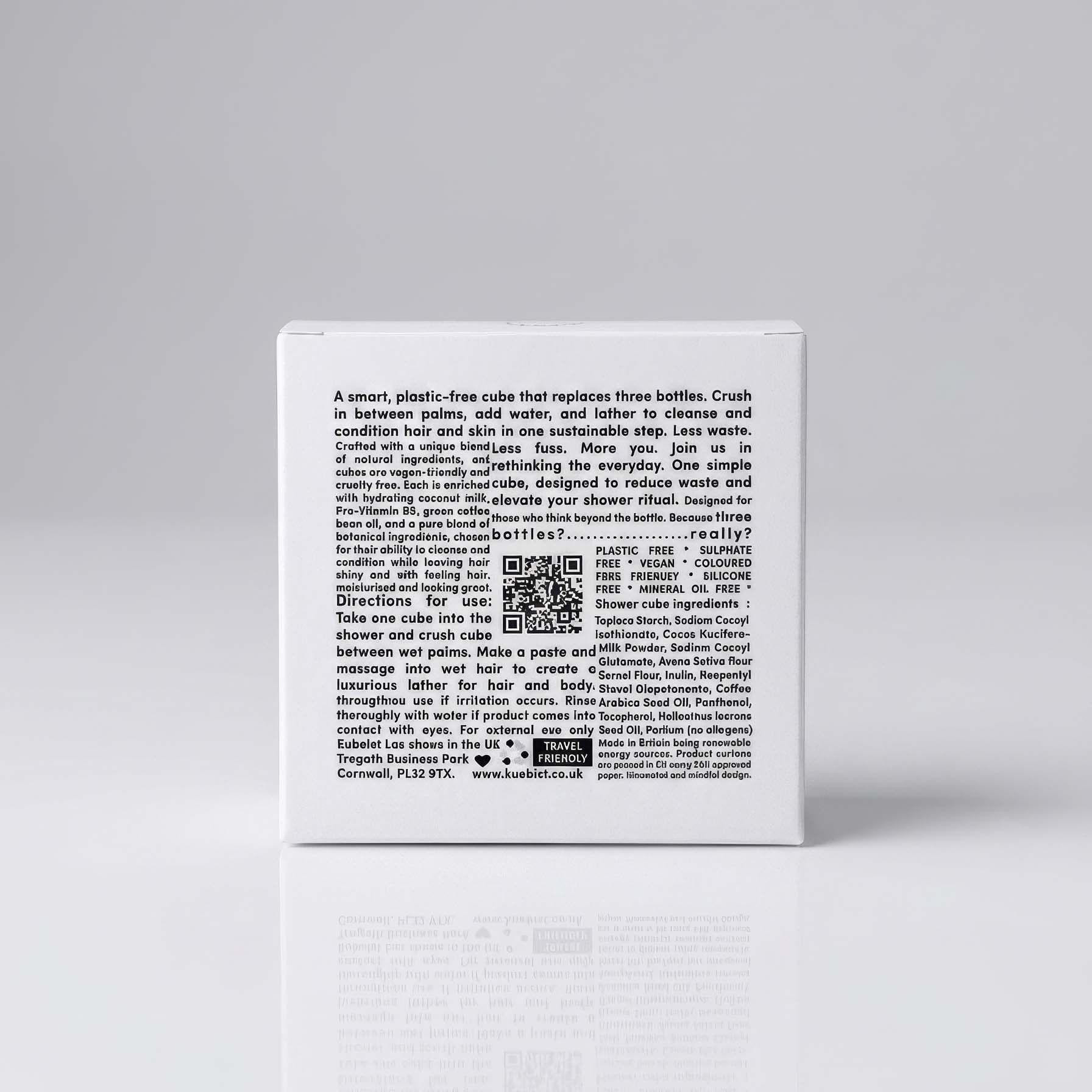 Kubeist 3 in Product packaging with text and QR code on a gray background plastic free shower cube 